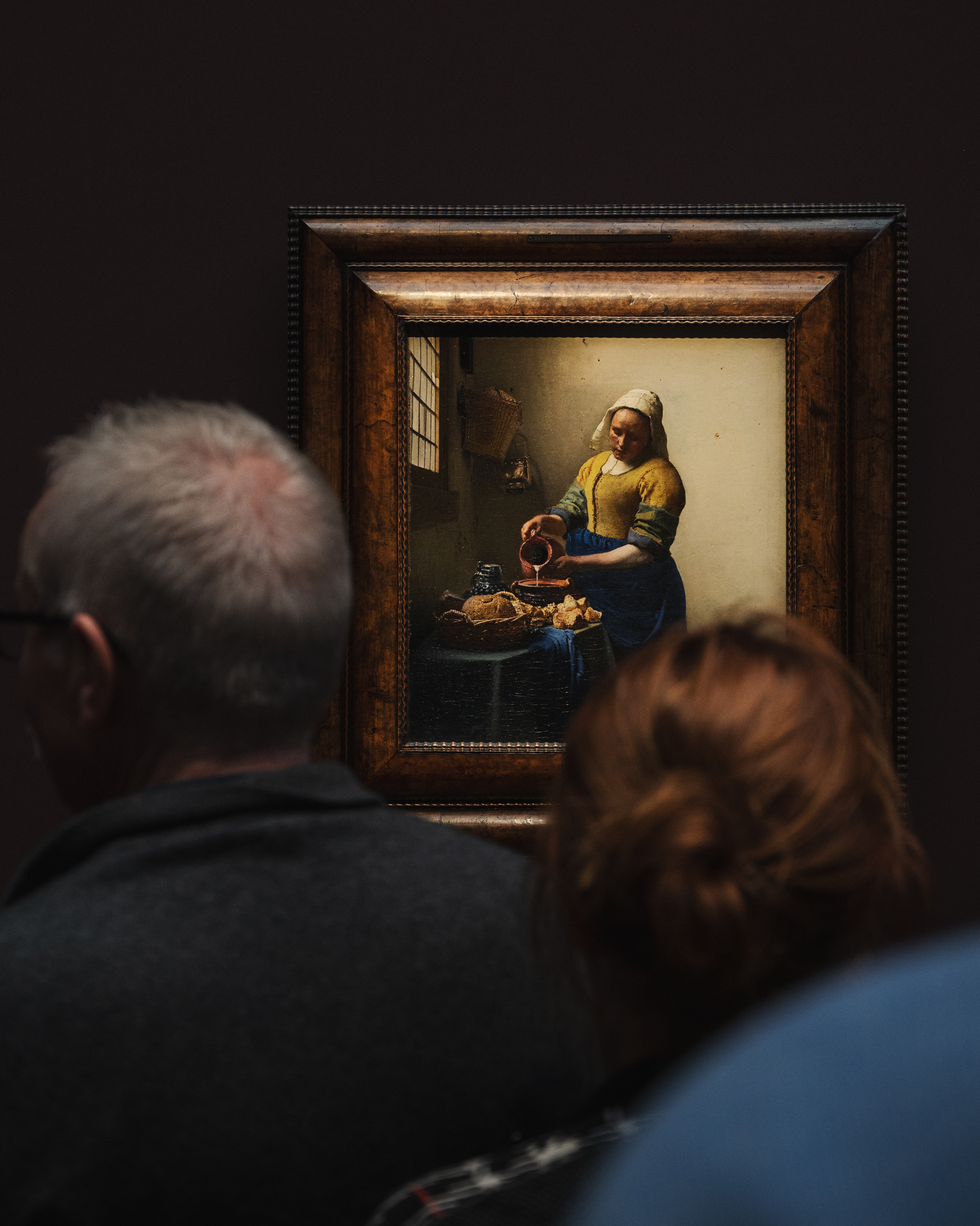 A photo of Vermeer's "The Milkmaid" featured in the Vermeer exhibition at the Rijksmuseum in Amsterdam.